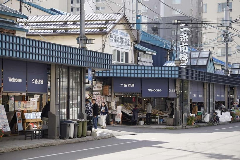 Authentic Sapporo: Nijo Market Seafood Lunch & History Tour - What the guides add to the morning