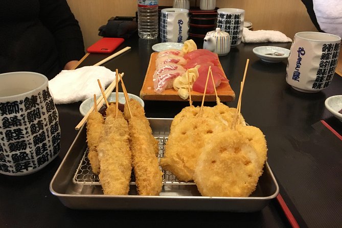 Eat, Drink & Cycle: Osaka Foodie Bike Tour - Sushi and Kushikatsu at the Finish