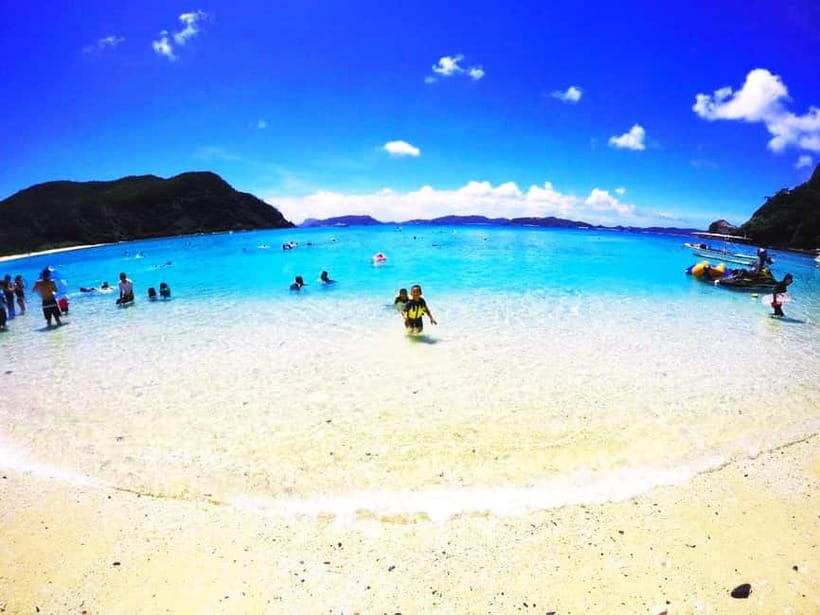 From Naha: Tokashiki Island Day Trip by Boat - The guides and group experience