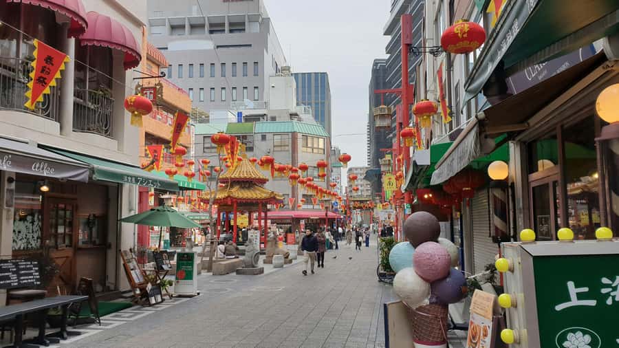 From Osaka: Nara, Kiyomizu-dera & Fushimi Inari Trip - Walking beneath Fushimi Inari’s red torii gates