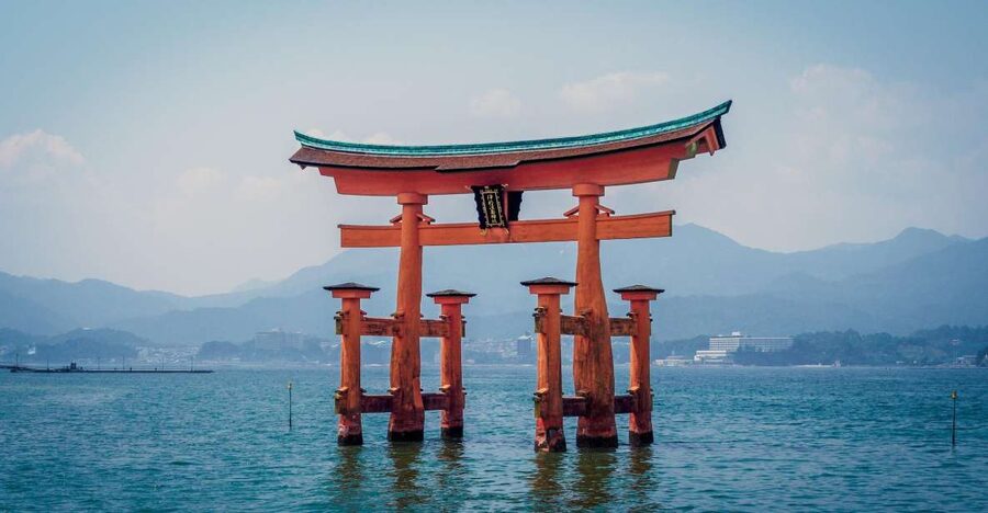 Hiroshima: Miyajima Peace Memorial Icons of Peace and Beauty - The tram and ferry journey to Miyajima