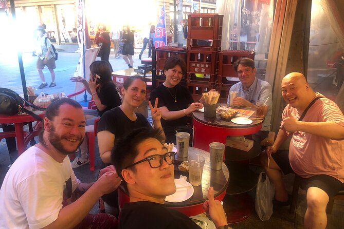 Hungry Osaka Street Food Tour:15 Tastings & 3 Drinks with a Local - Karaage, yakitori, takoyaki, and udon
