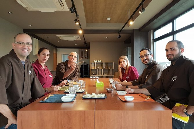 Izakaya Style Cooking Class - Sitting down for dinner together