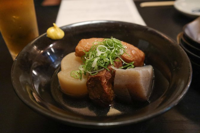 Kyoto Night Foodie Tour in Gion (9+ dishes + 6 Sake tastings) - Walking beside the Kamo River