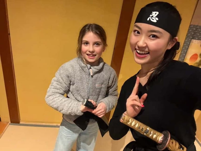 Kyoto: Ninja Experience Cafe Kyoto Gion - Testing your aim with the blowgun