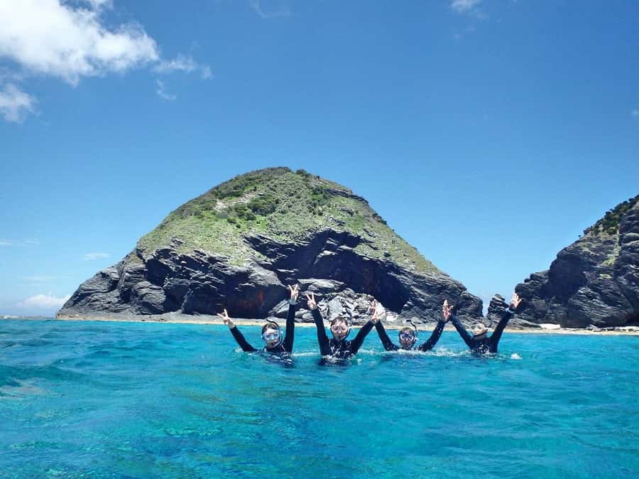 Okinawa : Kerama Whole Day Snorkeling Tour From Chatan/Naha - Photos, coral care, and sun protection