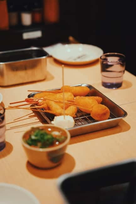 Osaka: 2-Hour Local Street Food Tour – Dotonbori & Namba - Food restrictions, walking, and group fit