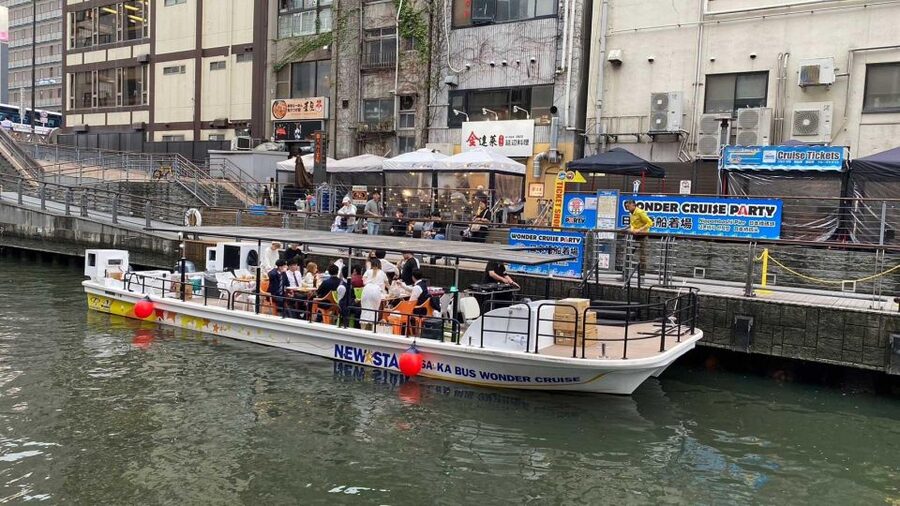 Osaka: Dotonbori District River Cruise with Drink Discount - The Glico Man stop is the photo payoff