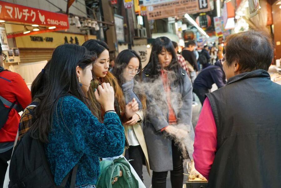 Osaka: Kuromon Market Food Walking Tour (6 stops, 6 tastes) - Meeting at Nipponbashi and Finding Your Guide