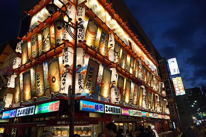 Osaka Local Foodie Walking Tour in Dotonbori and Shinsekai - Dotonbori’s Glico sign and the final food stop