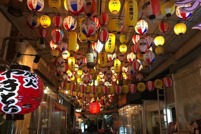 Osaka Nighttime tour - Stop one: traditional vendor food in Tenjinbashi