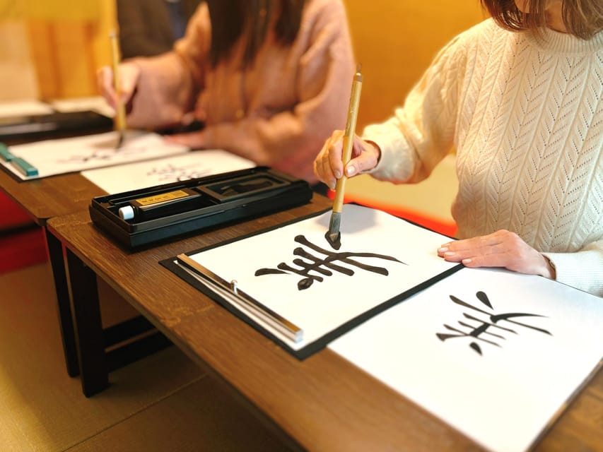 Osaka: Private Japanese Calligraphy Experience - Making the final artwork on colored paper
