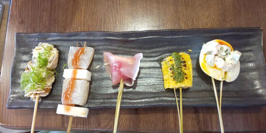 Osaka: Shinsekai Food Tour with 13-15 Dishes at 5 Eateries - A traditional restaurant with beef and tofu stew