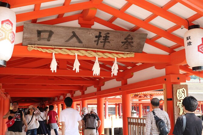 Peaceful Hiroshima & Miyajima UNESCO 1 Day Bus Tour - Entering Itsukushima Shrine and Seeing the Torii Gate