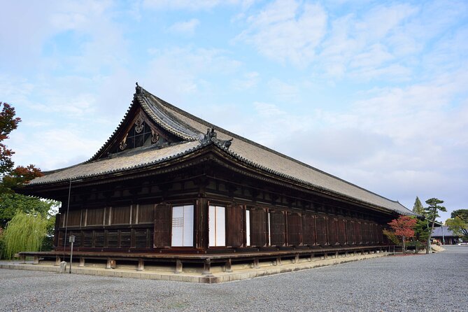 PERFECT KYOTO 1-Day Bus Tour - Nijo Castle appears from the coach window