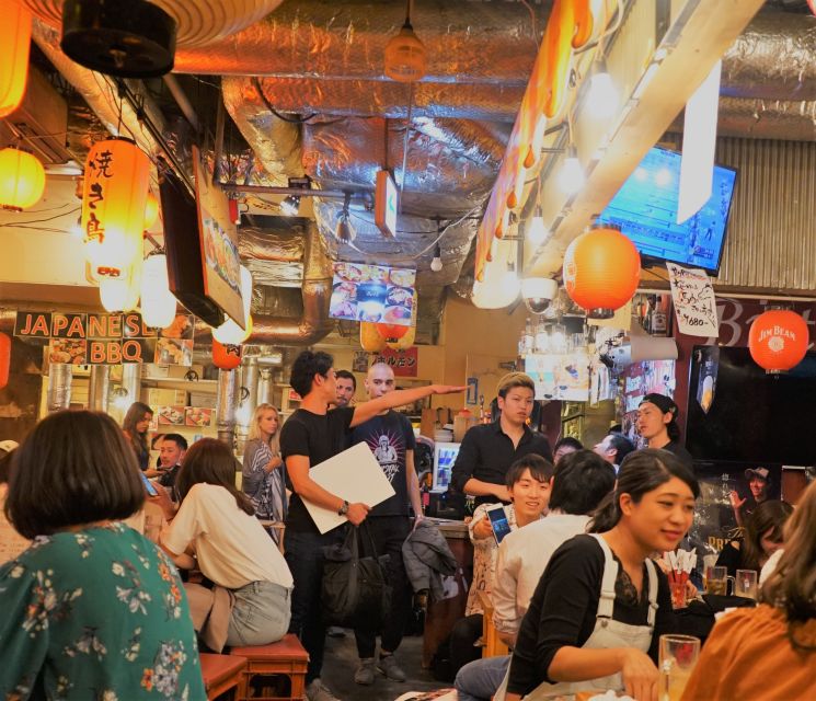 Shibuya Meltdown Night Tour: All-You-Can-Drink Bar Hopping - Starting beneath the SHIBUYA TSUTAYA sign