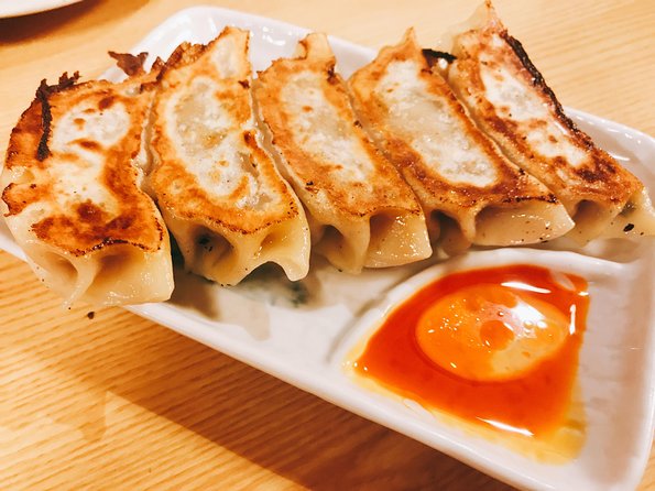 Shibuya Meltdown Nightlife Tour: All-You-Can-Drink Bar Hopping - Local izakaya food, drinks, and the karaoke question