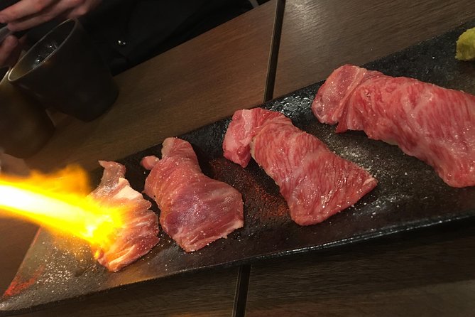 Shibuya Meltdown Nightlife Tour: All-You-Can-Drink Bar Hopping - The indoor meat alley and its izakaya menu