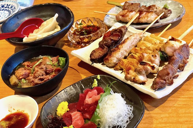 Shinjuku: Golden Gai Food Tour - Walking through Shinjuku’s old and new sides
