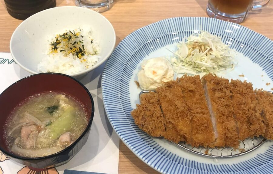 Tokyo: Challenge Sumo Wrestlers and Enjoy Meal - Trying the sumo costume yourself