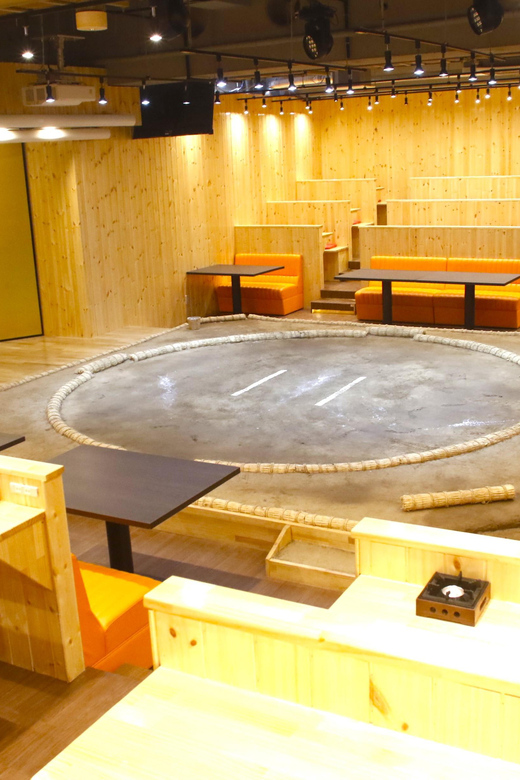 Tokyo: Sumo Show Experience with Chicken Hot Pot and a Photo - A sumo ring in the middle of dinner